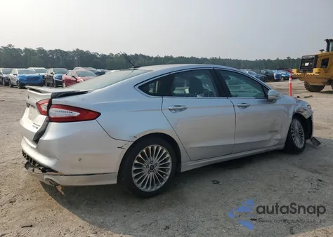 2013 Ford Fusion Titanium Hev z USA, uszkodzony, nr VIN 3FA6P0RU0DR382182